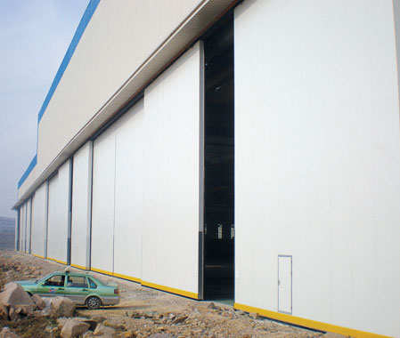 遼寧紅沿河核電公司-平開工業(yè)門案例 - 中出網(wǎng)-智能出入口與停車充電門戶