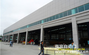 益陽沅江太陽鳥車間抗風卷簾門案例 - 中出網-智能出入口與停車充電門戶